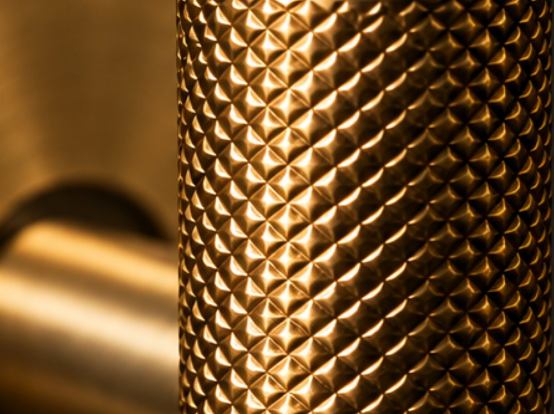 Knurled brass, worked under pressure