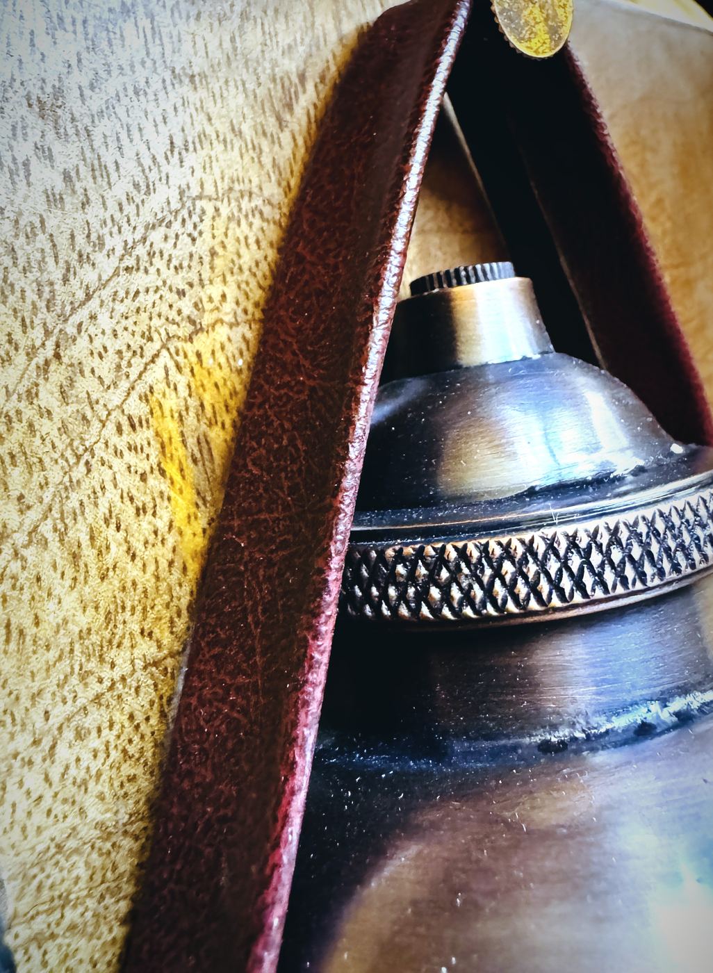 Leather loop against metal